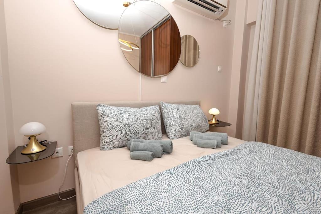 Postel nebo postele na pokoji v ubytování Summer flat by the beach&Taverna