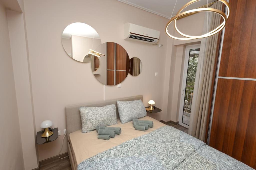 Postel nebo postele na pokoji v ubytování Summer flat by the beach&Taverna