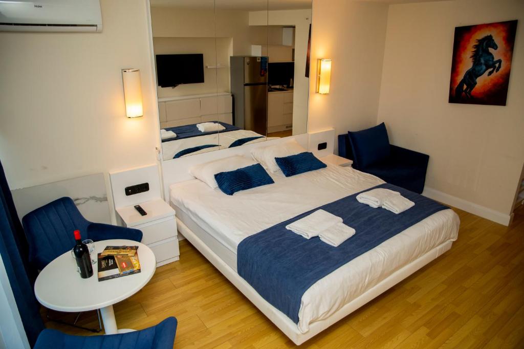 Postel nebo postele na pokoji v ubytování VIP APARTmENTS N2
