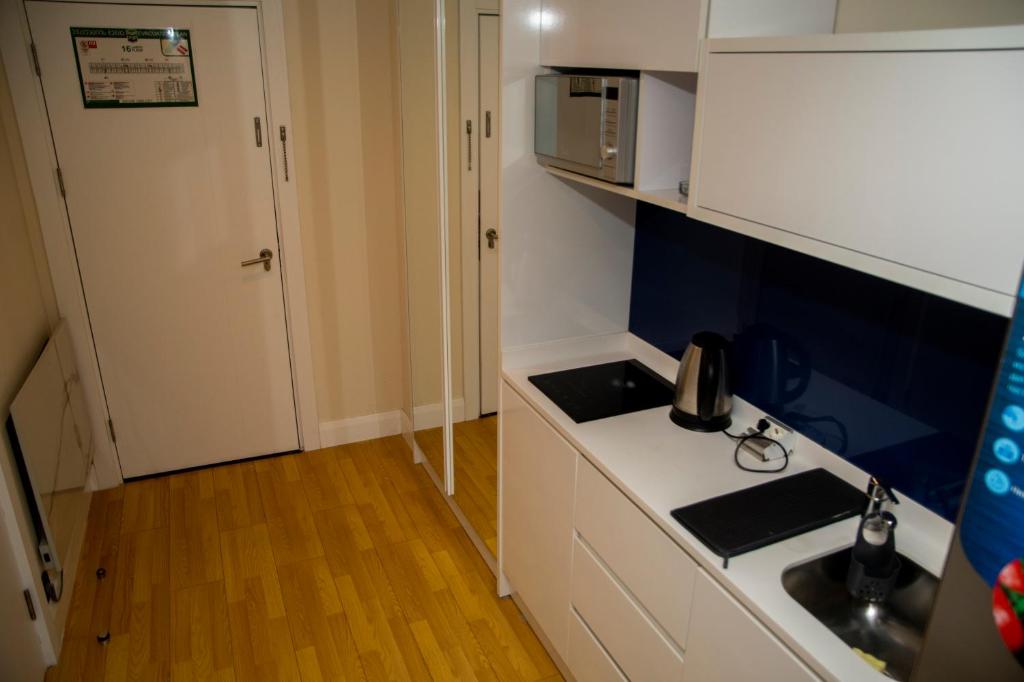 Kuchyň nebo kuchyňský kout v ubytování VIP APARTmENTS N2