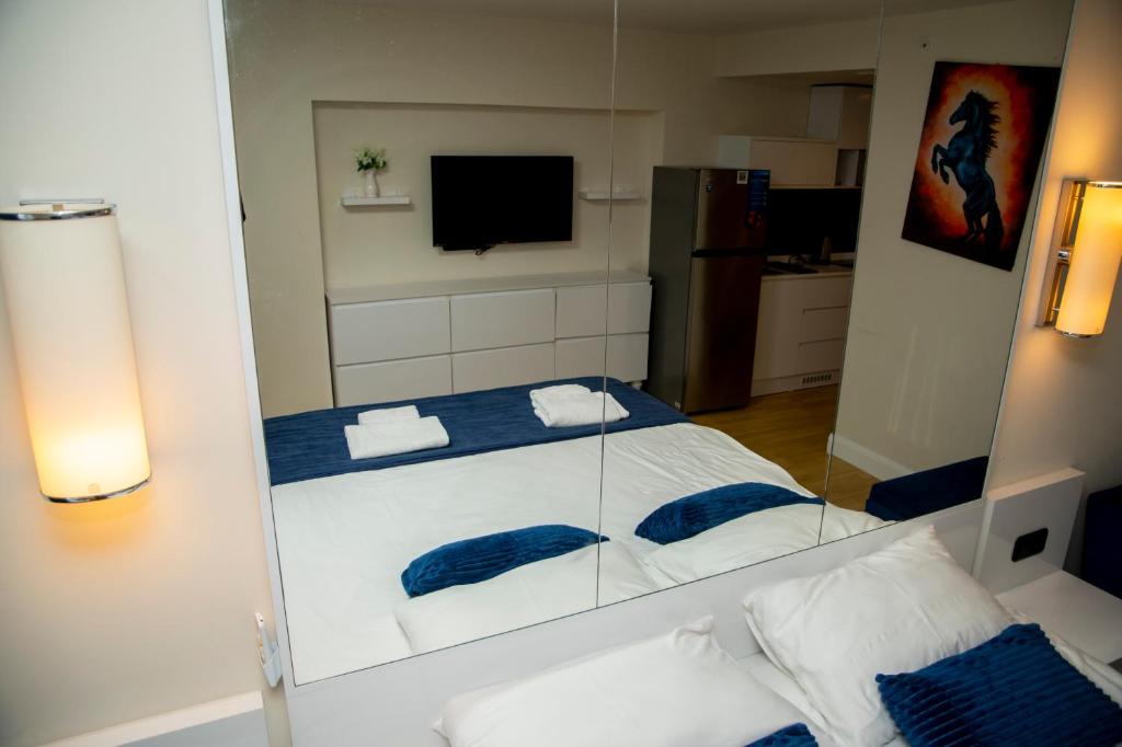 Postel nebo postele na pokoji v ubytování VIP APARTmENTS N2