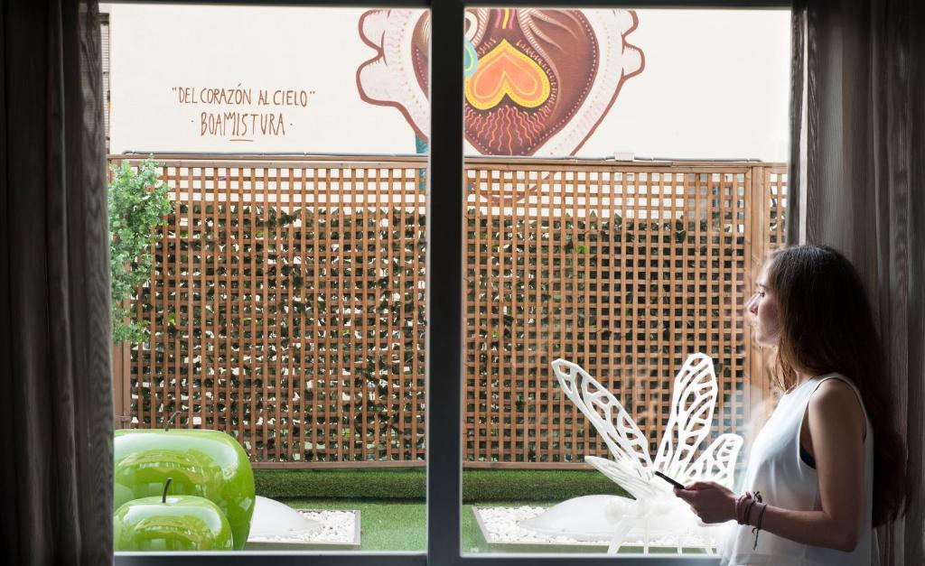 Apartosuites Jardines de Sabatini - Resim 26