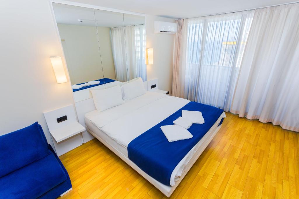 Postel nebo postele na pokoji v ubytování VIP APARTmENTS N10