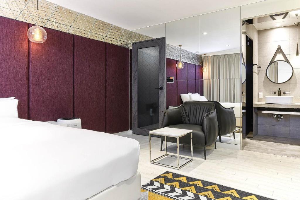 Postel nebo postele na pokoji v ubytování Wonju May hotel