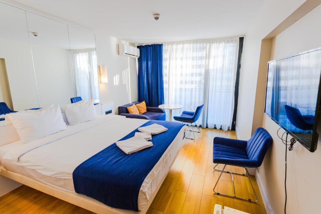 Postel nebo postele na pokoji v ubytování VIP APARTmENTS N10