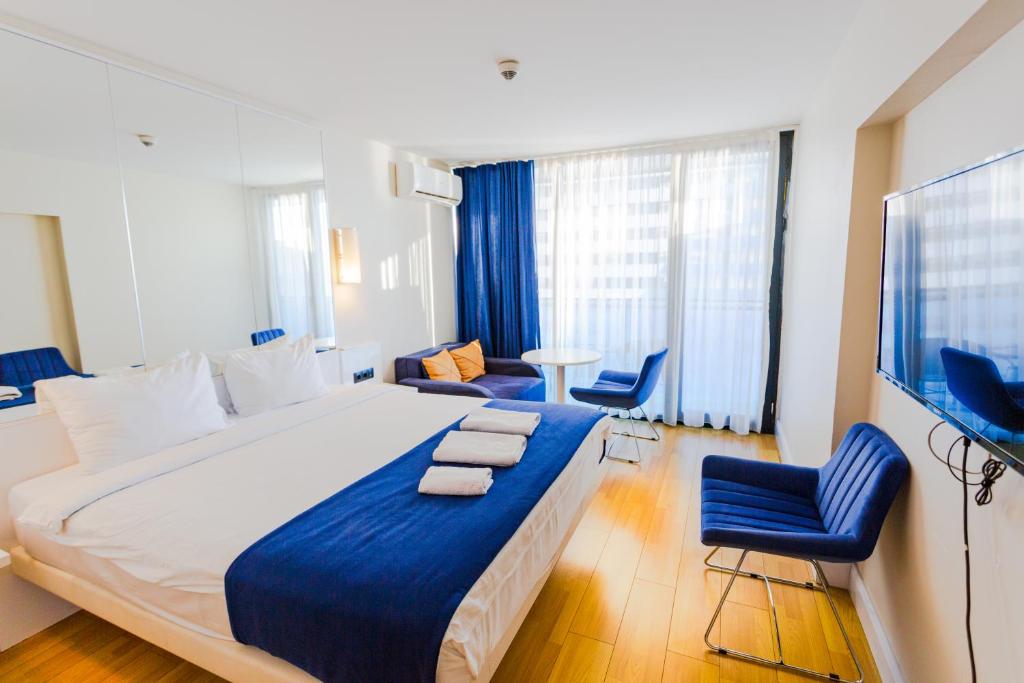 Postel nebo postele na pokoji v ubytování VIP APARTmENTS N10