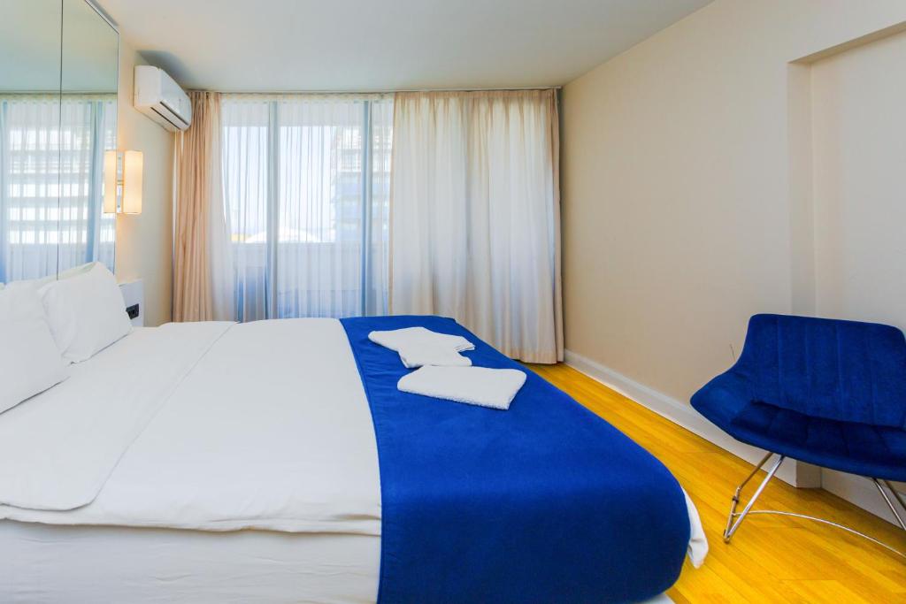 Postel nebo postele na pokoji v ubytování VIP APARTmENTS N10