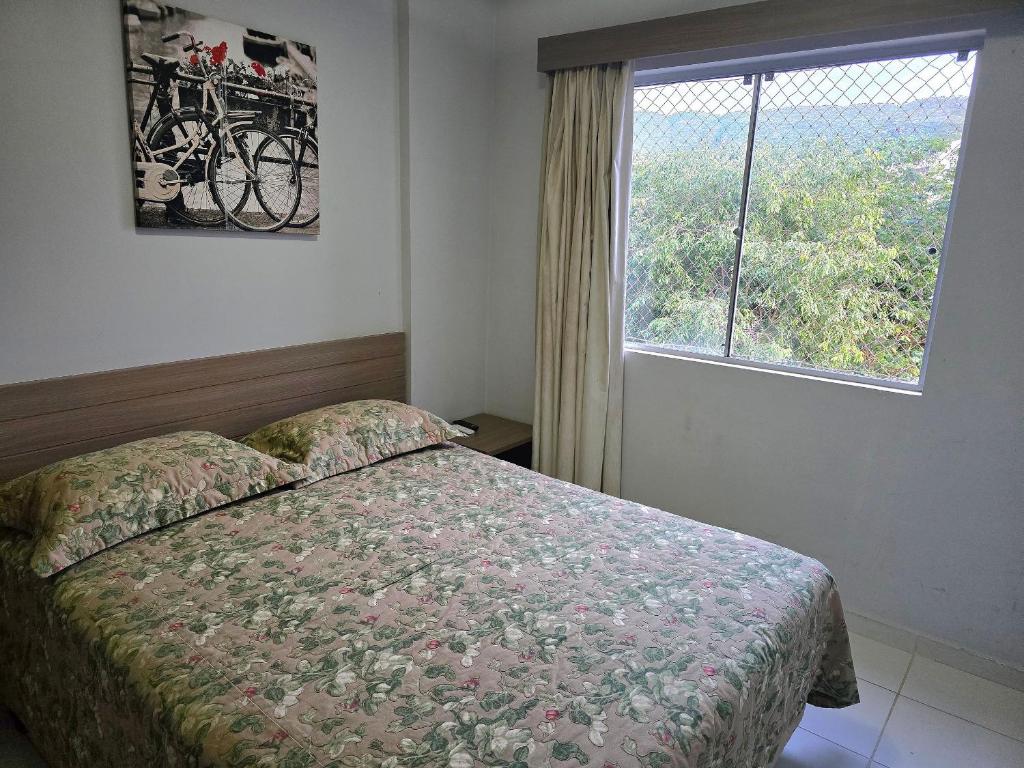 Postel nebo postele na pokoji v ubytování Apartamentos em Rio Quente com maravilhosa área de lazer e excelente localização