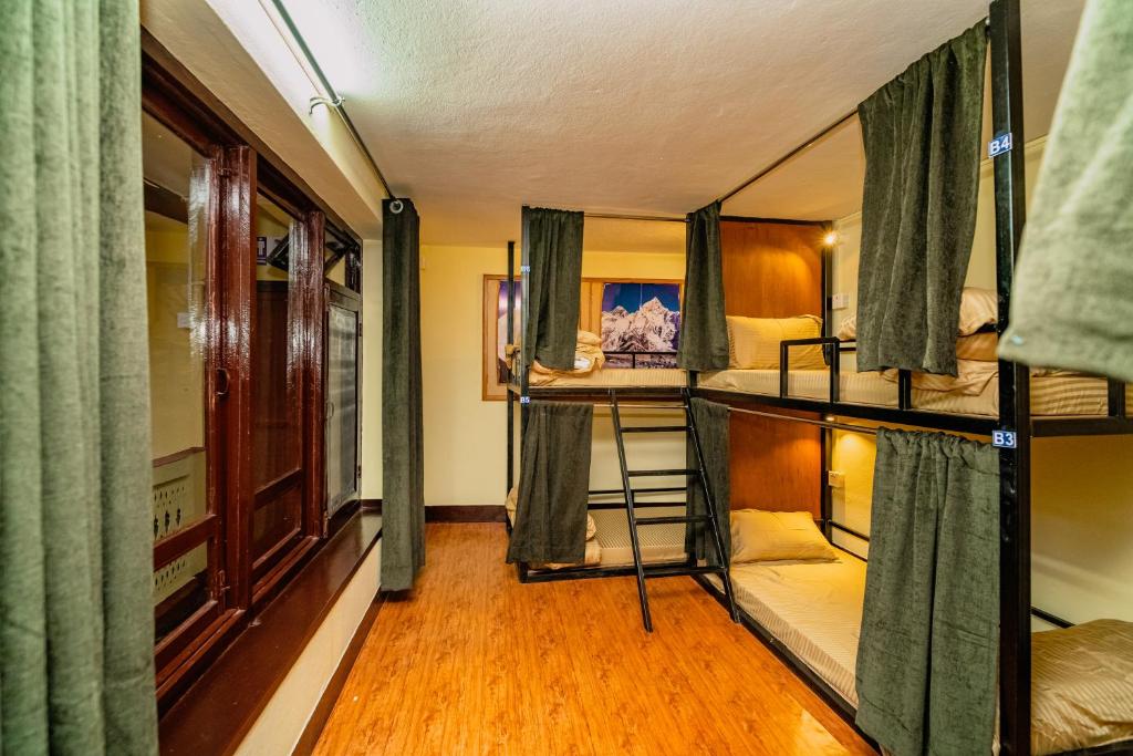 TV a/nebo společenská místnost v ubytování Kwabahal Boutique Hostel