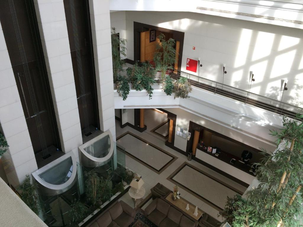 an overhead view of a bathroom with two urinals at Riviera Hotel in Carcavelos