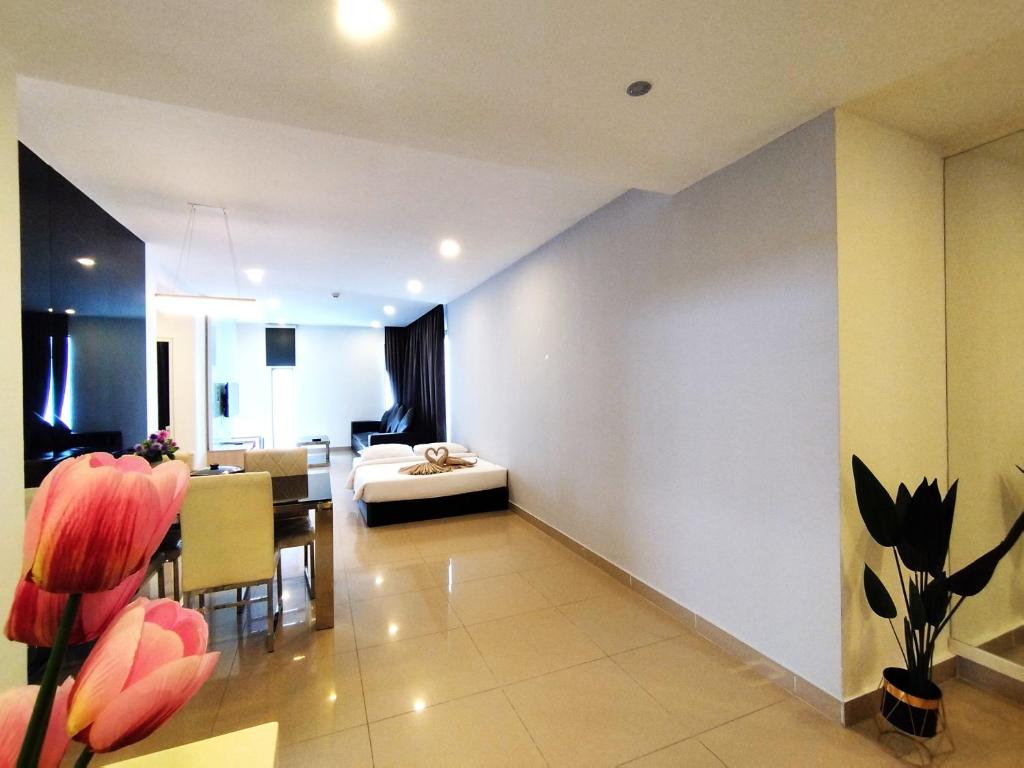 Ένα ή περισσότερα κρεβάτια σε δωμάτιο στο Genting SkyComfyColdInn2R2B AT Ion Delemen