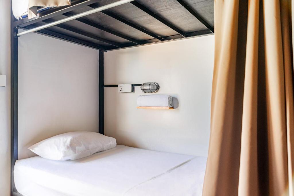 Postel nebo postele na pokoji v ubytování Sepeda Hostel