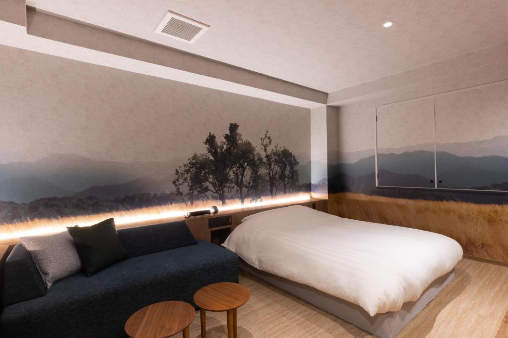 Postel nebo postele na pokoji v ubytování Hotel Foroot - Adult Only