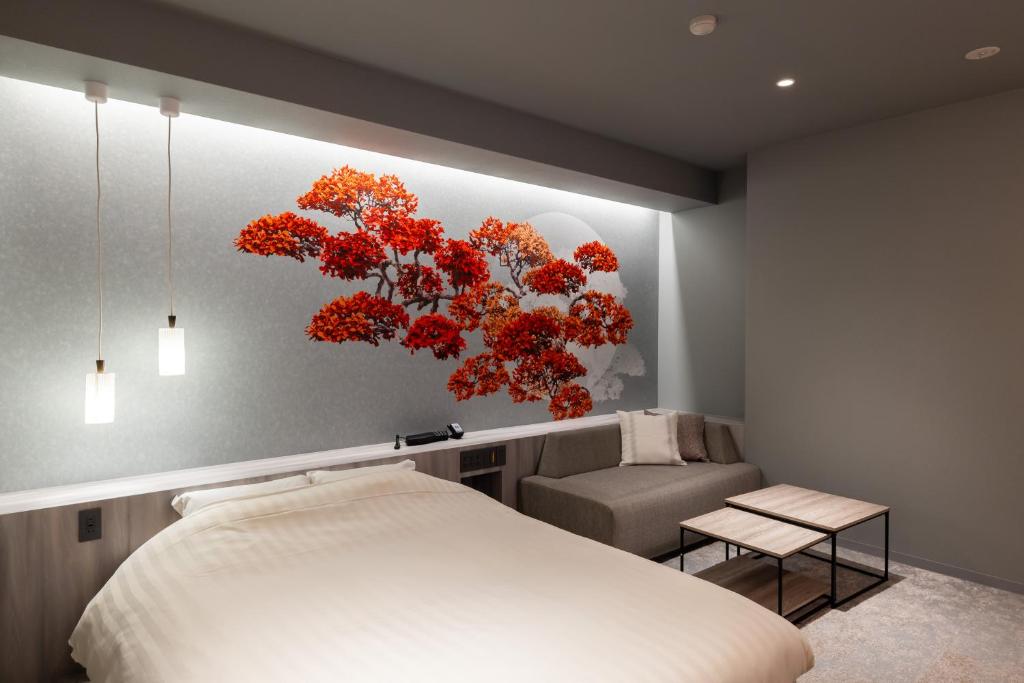 Postel nebo postele na pokoji v ubytování Hotel Foroot - Adult Only