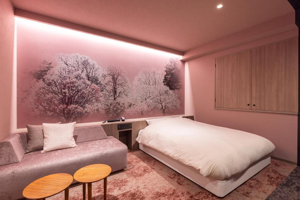 Postel nebo postele na pokoji v ubytování Hotel Foroot - Adult Only
