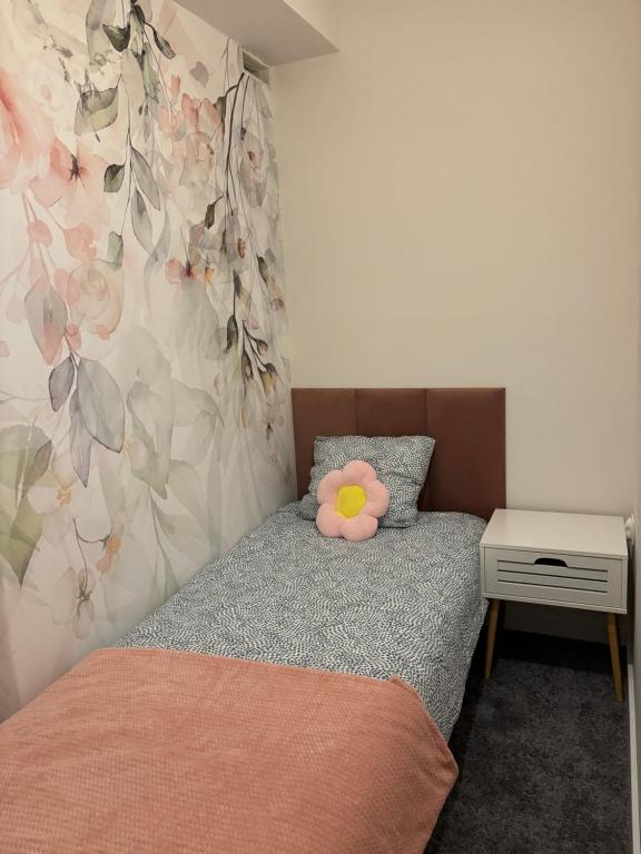 Postel nebo postele na pokoji v ubytování SheSpace Apartrooms