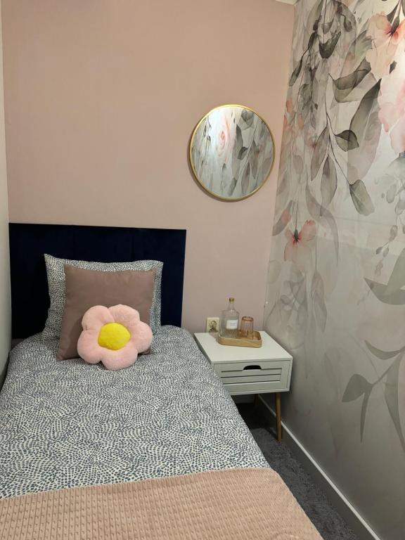Postel nebo postele na pokoji v ubytování SheSpace Apartrooms