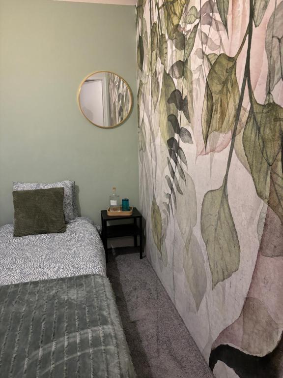 Postel nebo postele na pokoji v ubytování SheSpace Apartrooms