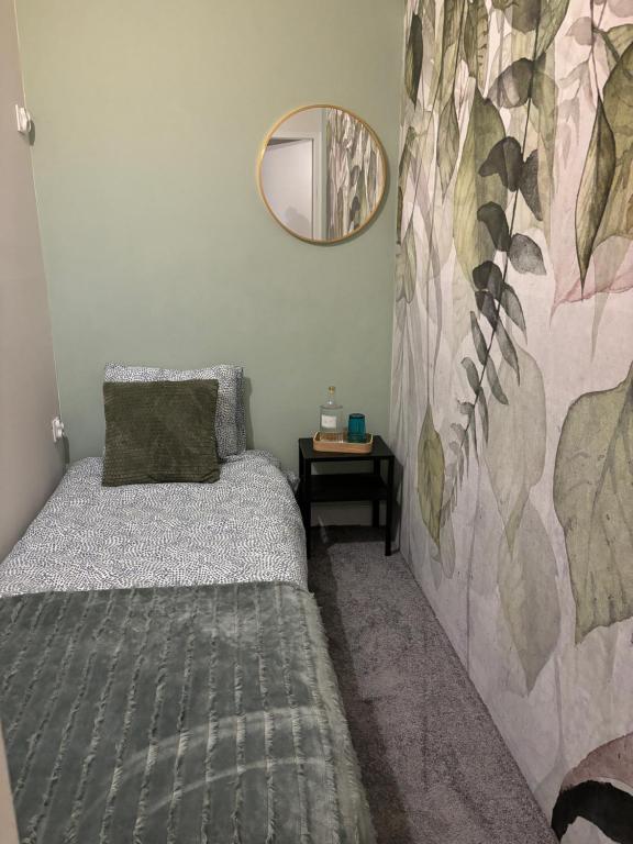 Postel nebo postele na pokoji v ubytování SheSpace Apartrooms