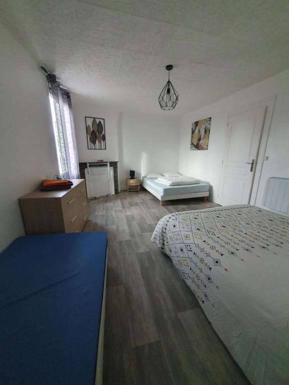 Postel nebo postele na pokoji v ubytování Nat'Autry