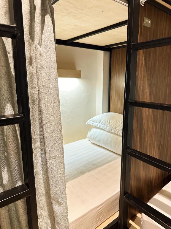 Postel nebo postele na pokoji v ubytování Jiran Hostel Kota Kinabalu