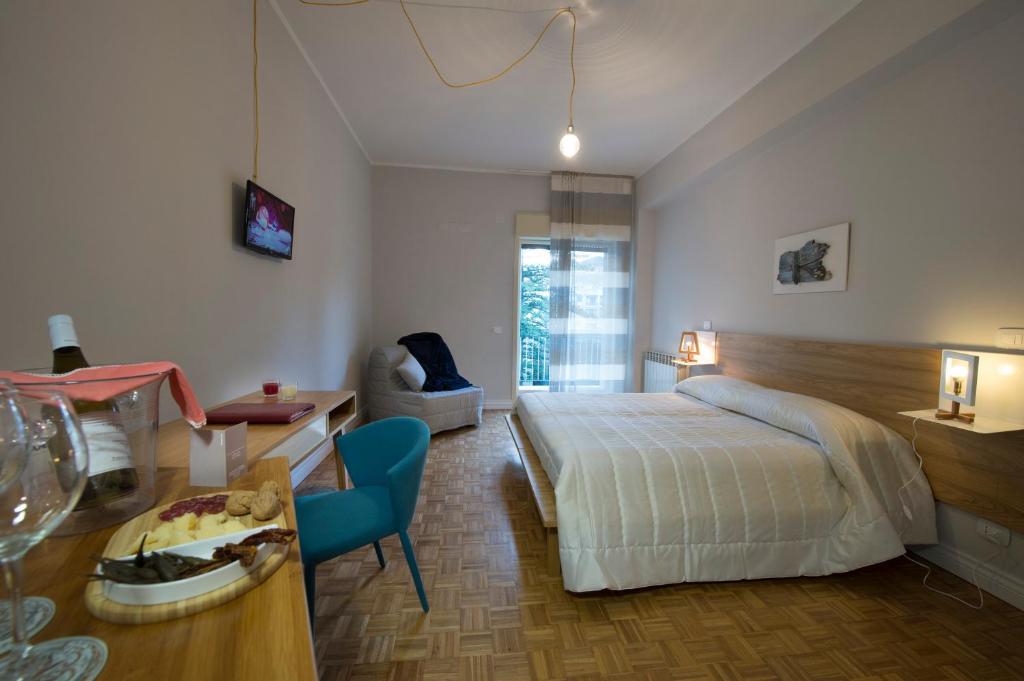 Postel nebo postele na pokoji v ubytování Ciauru Design B&B