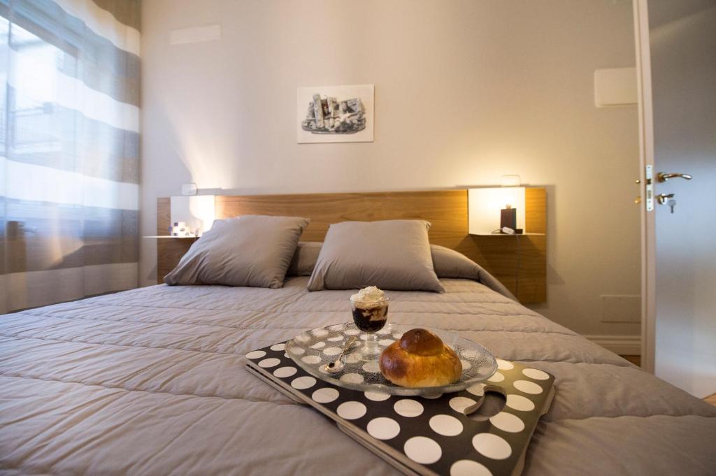 Postel nebo postele na pokoji v ubytování Ciauru Design B&B