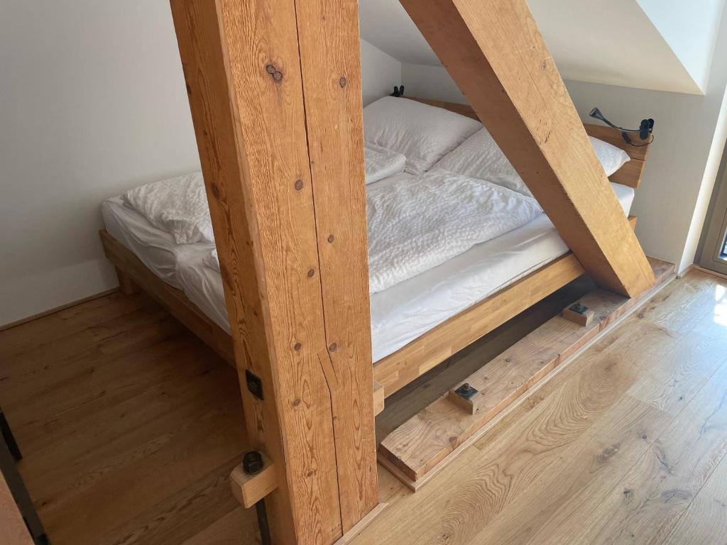Postel nebo postele na pokoji v ubytování Fewo Bergstories