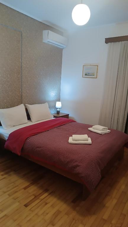 Posteľ alebo postele v izbe v ubytovaní Spiri's House-Deluxe Apartment in Kalabaka-Meteora