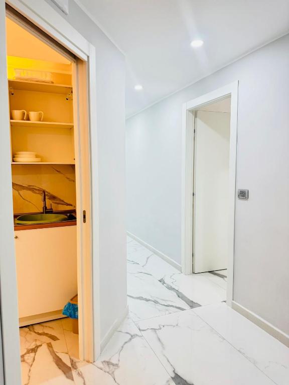 Postel nebo postele na pokoji v ubytování Limoni Inn Messina