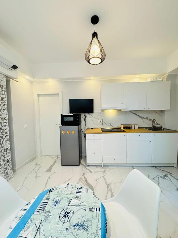 Kuchyň nebo kuchyňský kout v ubytování Limoni Inn Messina