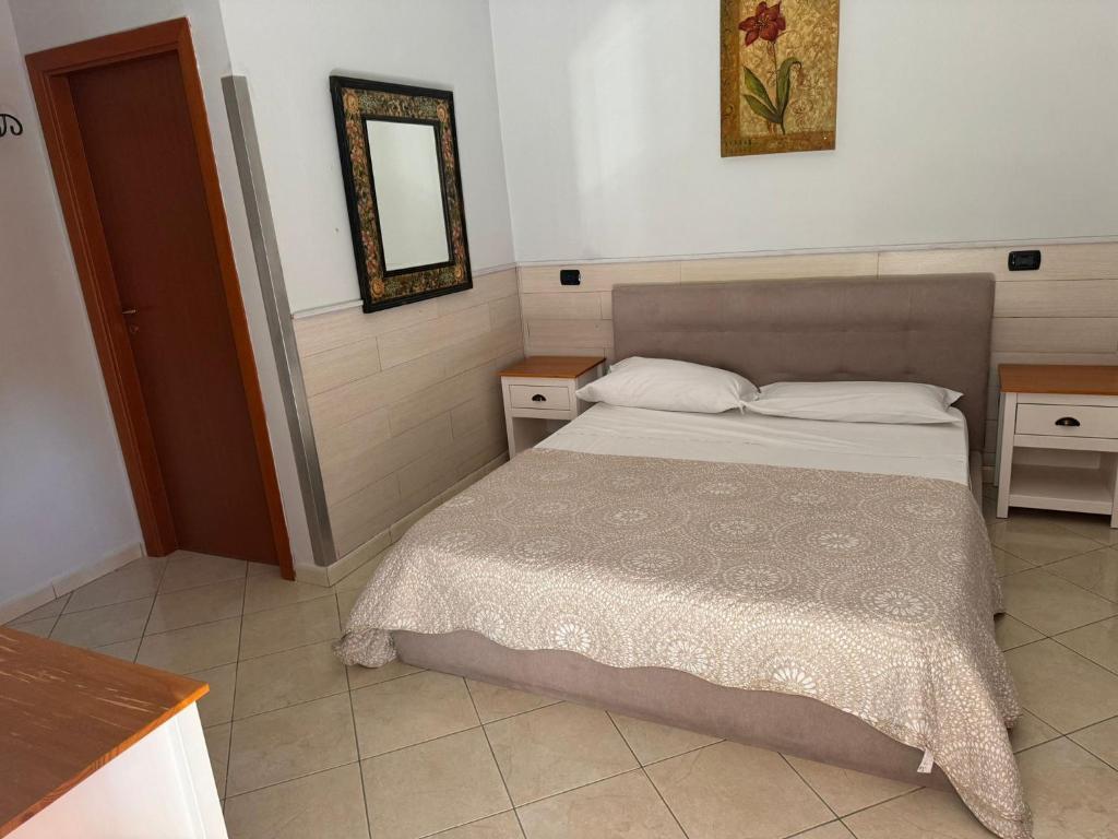 Postel nebo postele na pokoji v ubytování Hotel VistaMare