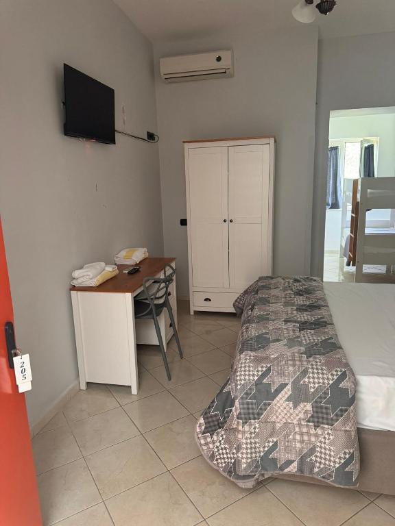 Postel nebo postele na pokoji v ubytování Hotel VistaMare