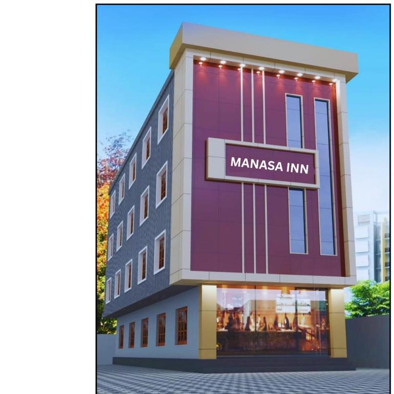 a rendering of a building with a manama inn sign on it at Manasa Inn in Palakkad