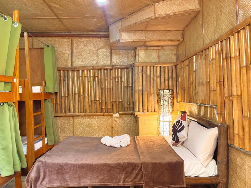 Postel nebo postele na pokoji v ubytování Galera Lodge & Cafe