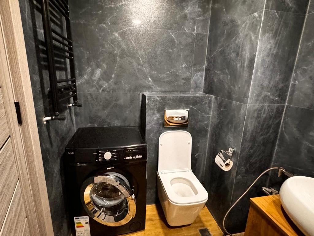 Koupelna v ubytování Luxury apartment with bedroom, new gudauri