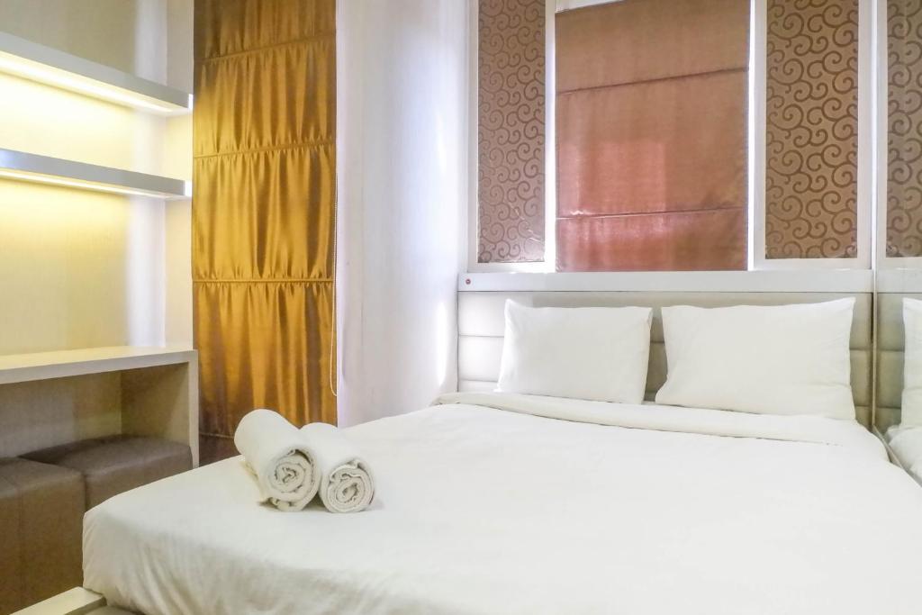 Trendy and Tidy Studio Room at Puri Mas Apartment By Travelio - Studio Apartment