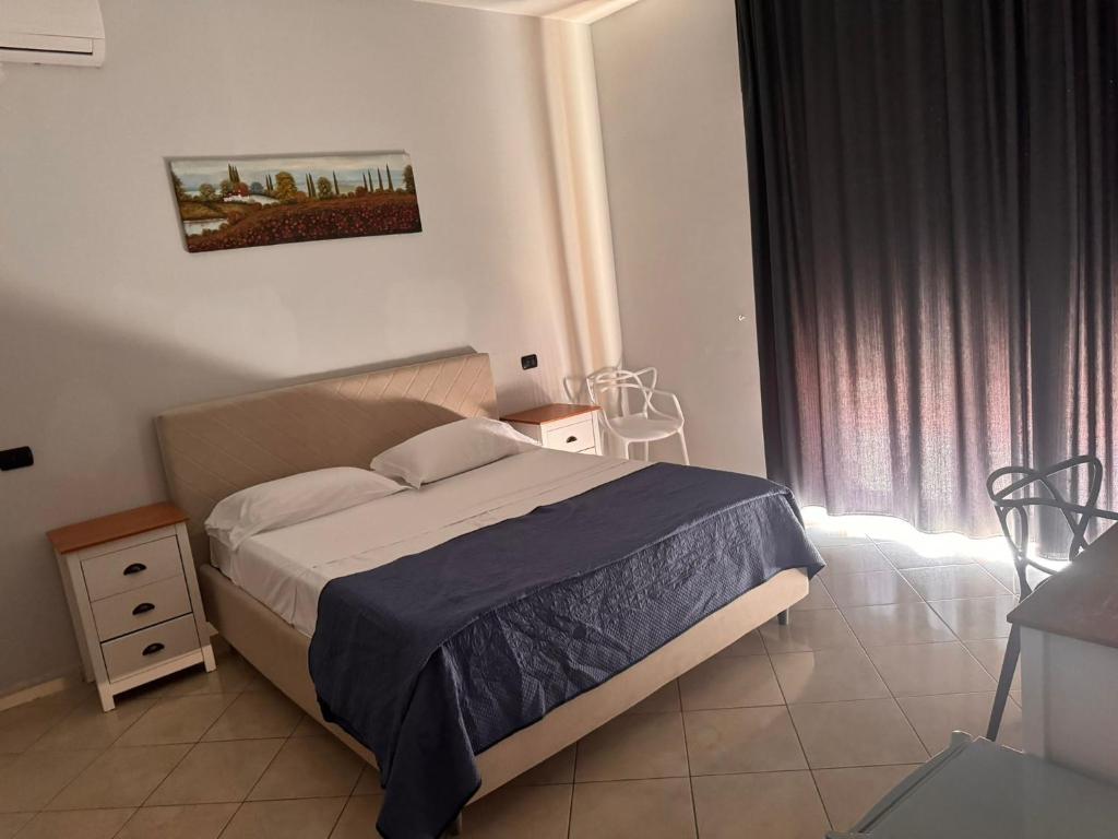 Postel nebo postele na pokoji v ubytování Hotel VistaMare