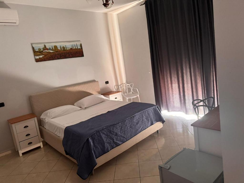 Postel nebo postele na pokoji v ubytování Hotel VistaMare