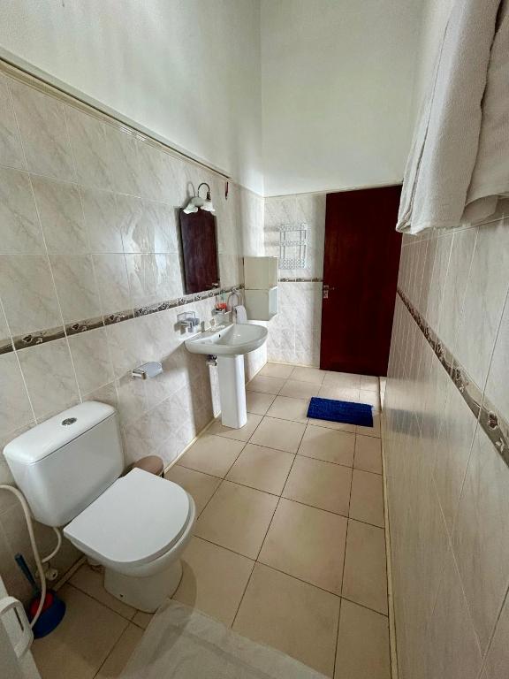 Koupelna v ubytování Reef Bungalow Hotel
