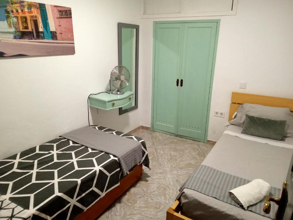 Postel nebo postele na pokoji v ubytování Casa Colmena