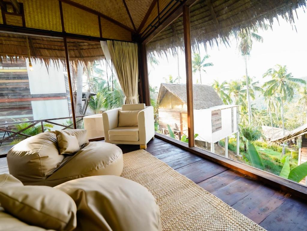Posezení v ubytování RoomQuest THEVA Resort Koh Samui