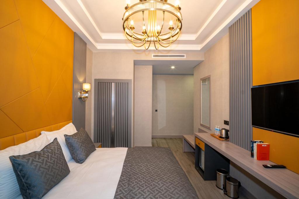 TV a/nebo společenská místnost v ubytování Icon Hotel Bomonti