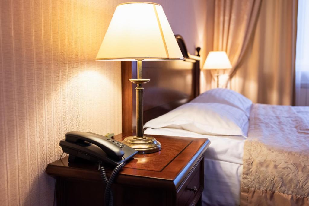 Postel nebo postele na pokoji v ubytování Solva Resort Medical & SPA