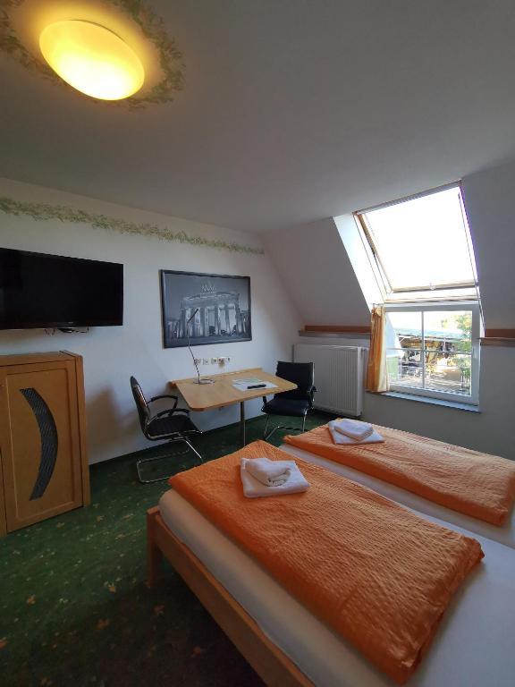 Postel nebo postele na pokoji v ubytování Hotel Bördehof, direkt an der A2 & A14, Restaurant, Tagung, individuell