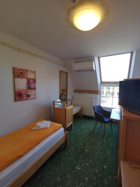 Postel nebo postele na pokoji v ubytování Hotel Bördehof, direkt an der A2 & A14, Restaurant, Tagung, individuell