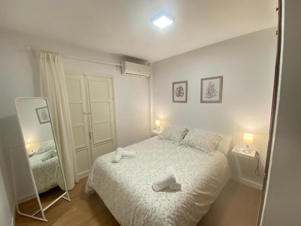 Postel nebo postele na pokoji v ubytování Sánchez Home, Pleno Centro