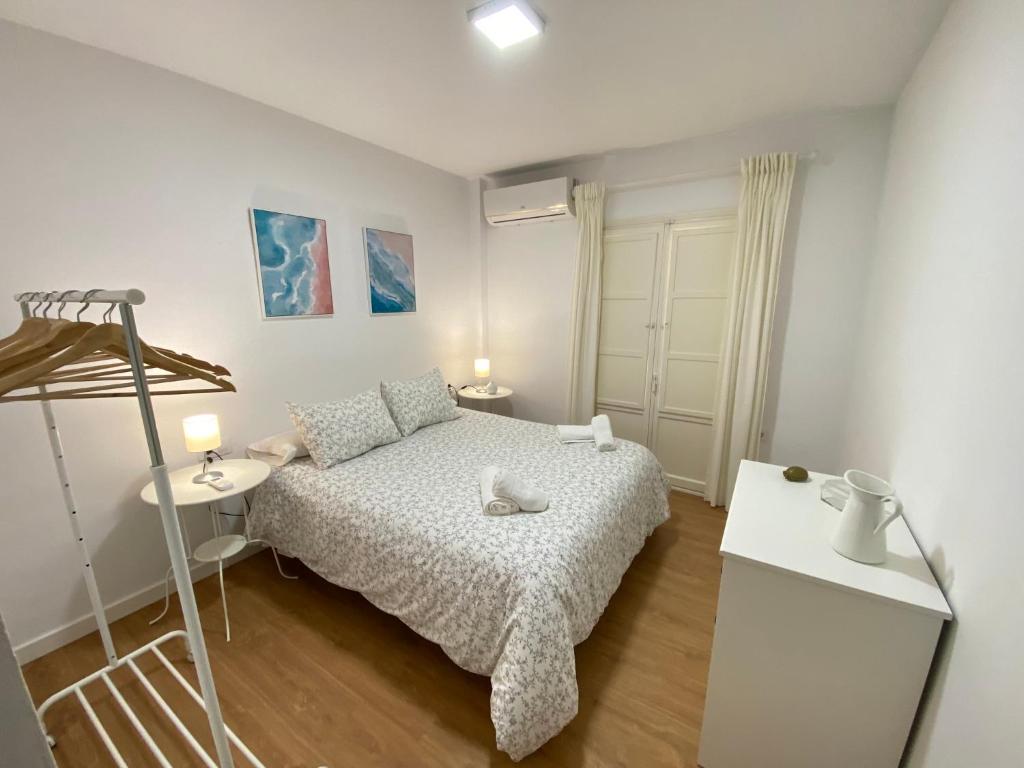 Postel nebo postele na pokoji v ubytování Sánchez Home, Pleno Centro