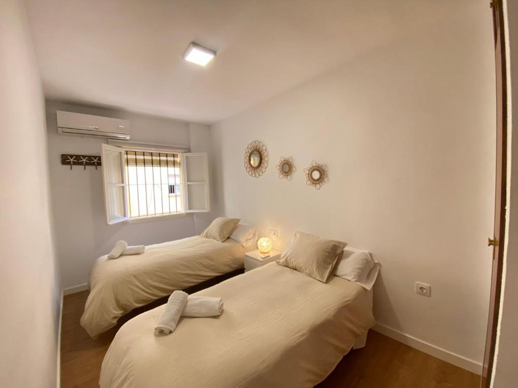 Postel nebo postele na pokoji v ubytování Sánchez Home, Pleno Centro