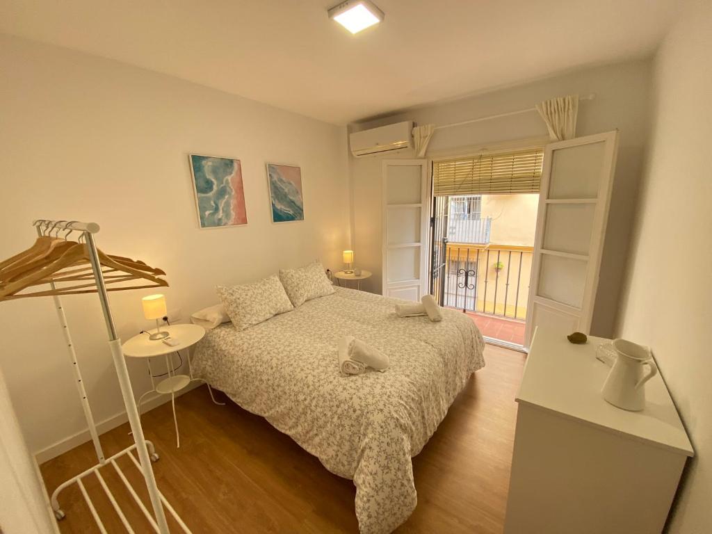 Postel nebo postele na pokoji v ubytování Sánchez Home, Pleno Centro